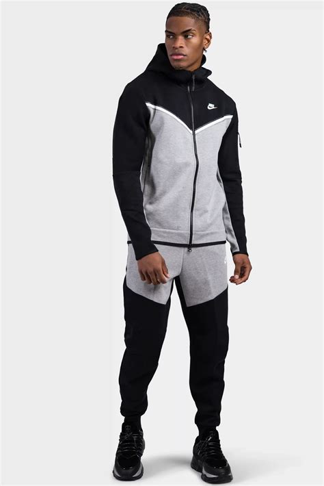 nike trainingspak zwart heren|joggingpak heren.